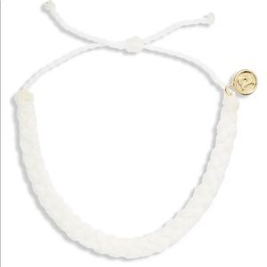 White braided Pura Vida bracelet with moon sticker